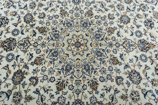 Central medallion detail of 2000s Kashan rug from Iran / Persia