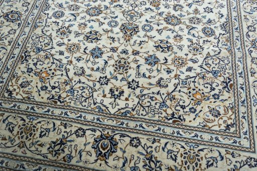 Close-up detail of 2000s Kashan rug from Iran / Persia showing Wool weave