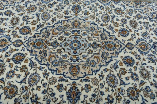 Central medallion detail of 2000s Kashan rug from Iran / Persia