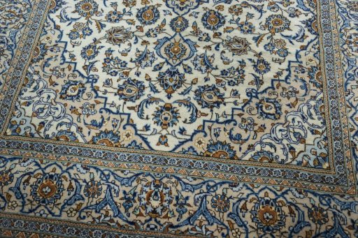 Close-up detail of 2000s Kashan rug from Iran / Persia showing Wool weave