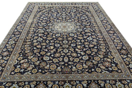 Surface texture of 2000s Kashan rug with natural Wool and intricate pattern