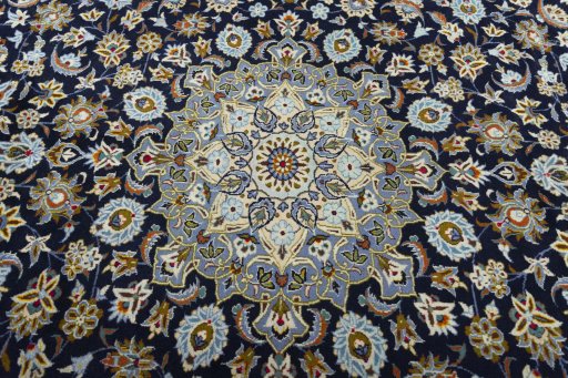 Central medallion detail of 2000s Kashan rug from Iran / Persia