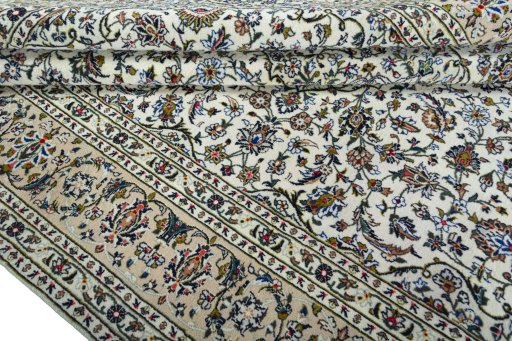 Close-up detail of 2000s Kashan rug from Iran / Persia showing Wool weave
