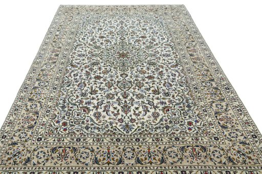 Surface texture of 2000s Kashan rug with natural Wool and intricate pattern