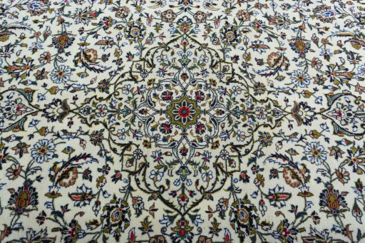 Central medallion detail of 2000s Kashan rug from Iran / Persia
