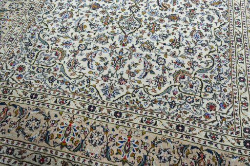 Close-up detail of 2000s Kashan rug from Iran / Persia showing Wool weave