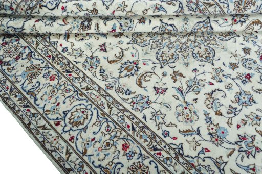 Close-up detail of 2000s Kashan rug from Iran / Persia showing Wool weave