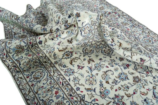 Surface texture of 2000s Kashan rug with natural Wool and intricate pattern