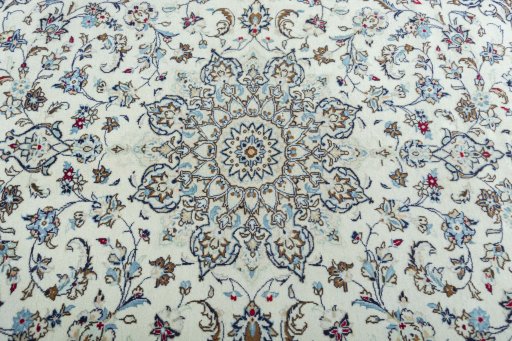 Central medallion detail of 2000s Kashan rug from Iran / Persia
