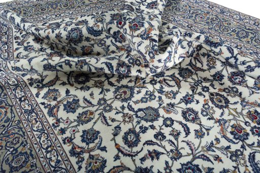 Surface texture of 2000s Kashan rug with natural Wool and intricate pattern