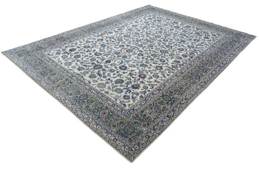 Corner detail of 2000s Kashan rug showing border pattern and Wool pile