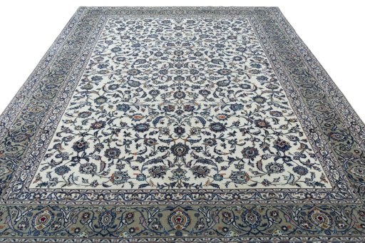 Surface texture of 2000s Kashan rug with natural Wool and intricate pattern