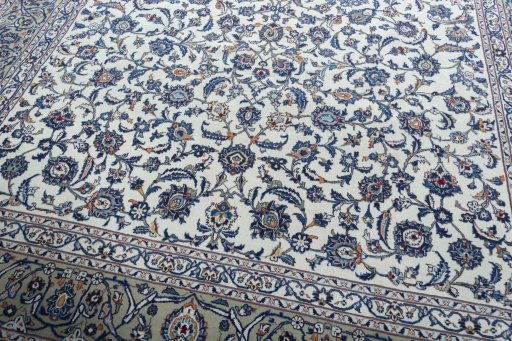 Close-up detail of 2000s Kashan rug from Iran / Persia showing Wool weave