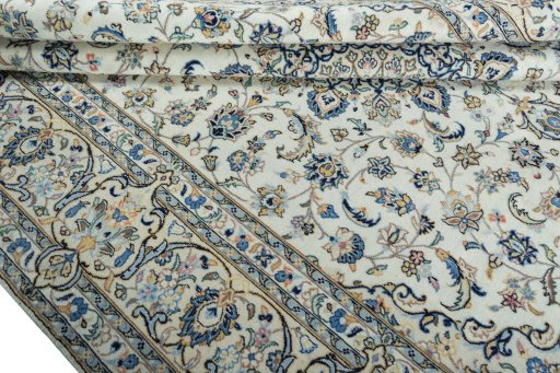 Close-up detail of 2000s Kashan rug from Iran / Persia showing Wool weave