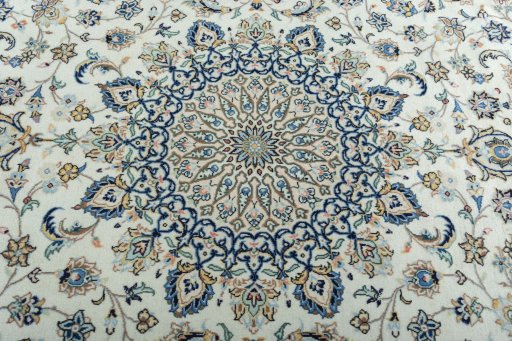 Central medallion detail of 2000s Kashan rug from Iran / Persia
