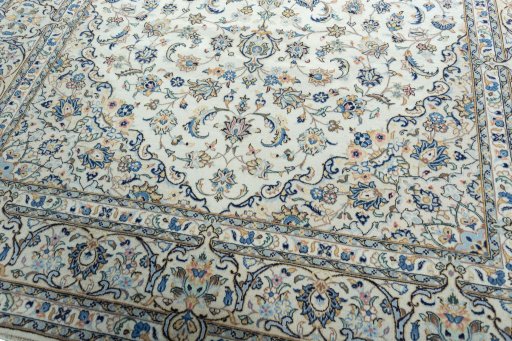 Close-up detail of 2000s Kashan rug from Iran / Persia showing Wool weave