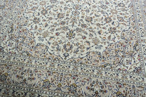Close-up detail of 2000s Kashan rug from Iran / Persia showing Wool weave