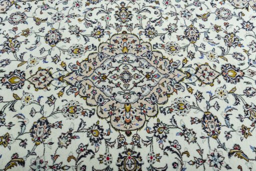 Central medallion detail of 2000s Kashan rug from Iran / Persia