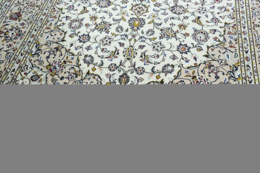 Close-up detail of 2000s Kashan rug from Iran / Persia showing Wool weave