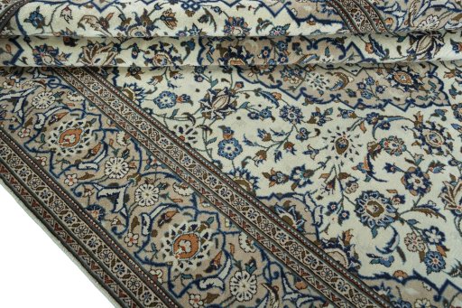 Close-up detail of 2000s Kashan rug from Iran / Persia showing Wool weave