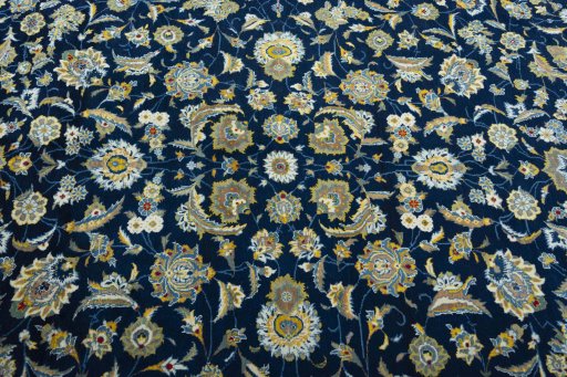Central medallion detail of 2000s Kashan rug from Iran / Persia
