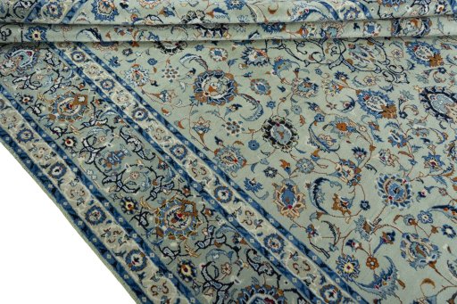 Close-up detail of 2000s Kashan rug from Iran / Persia showing Wool weave