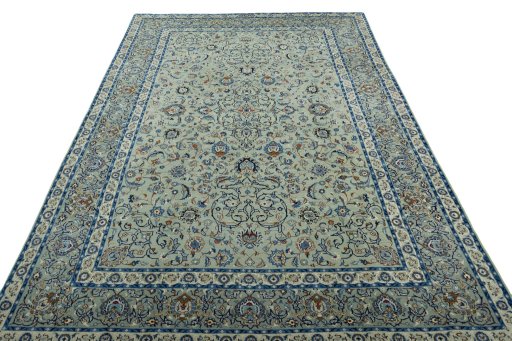 Surface texture of 2000s Kashan rug with natural Wool and intricate pattern
