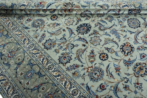 Close-up detail of 2000s Kashan rug from Iran / Persia showing Wool weave