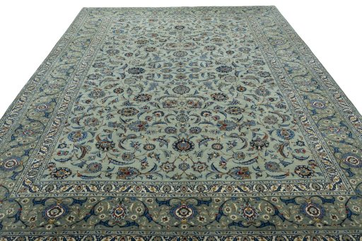 Surface texture of 2000s Kashan rug with natural Wool and intricate pattern
