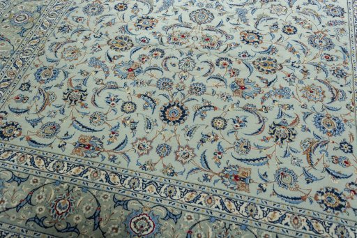 Close-up detail of 2000s Kashan rug from Iran / Persia showing Wool weave