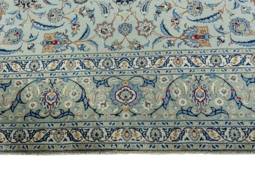 Full view of 2000s Kashan rug from Iran / Persia, 404 × 303 cm in Blue tones