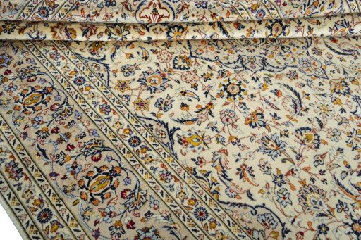 Close-up detail of 2000s Kashan rug from Iran / Persia showing Wool weave