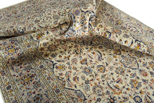 Surface texture of 2000s Kashan rug with natural Wool and intricate pattern