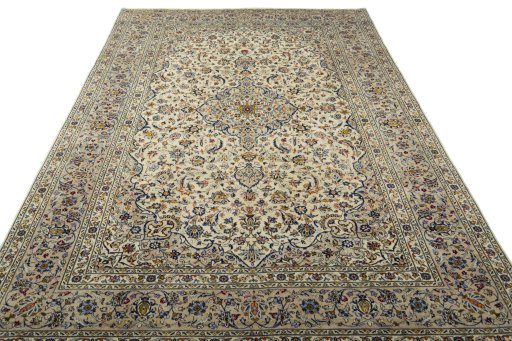 Surface texture of 2000s Kashan rug with natural Wool and intricate pattern