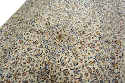 Backside of handmade 2000s Kashan rug showing knot structure and weave density