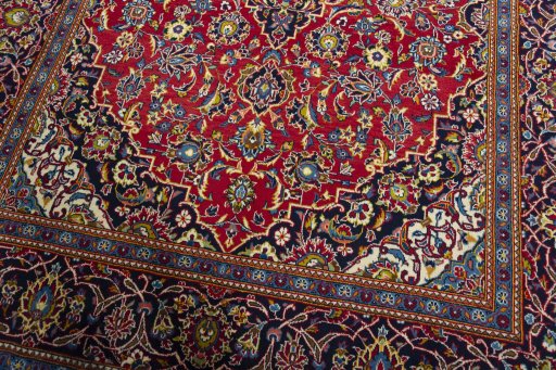 Close-up detail of 2000s Kashan rug from Iran / Persia showing Wool weave