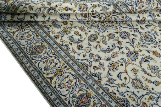 Close-up detail of New Kashan rug from Iran / Persia showing Wool weave