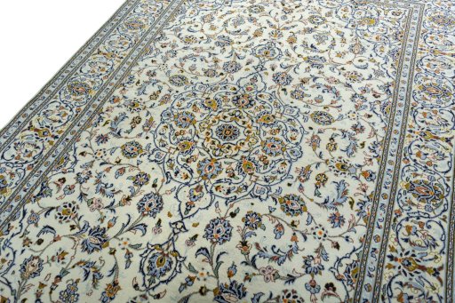 Backside of handmade New Kashan rug showing knot structure and weave density