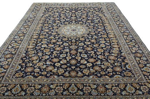 Surface texture of 2000s Kashan rug with natural Wool and intricate pattern
