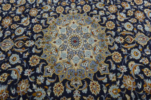 Central medallion detail of 2000s Kashan rug from Iran / Persia