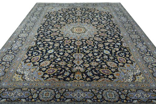 Surface texture of 2000s Kashan rug with natural Wool and intricate pattern