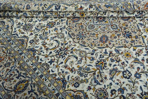 Close-up detail of 2000s Kashan rug from Iran / Persia showing Wool weave