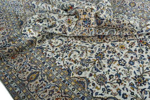 Surface texture of 2000s Kashan rug with natural Wool and intricate pattern