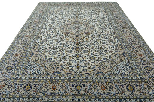 Surface texture of 2000s Kashan rug with natural Wool and intricate pattern