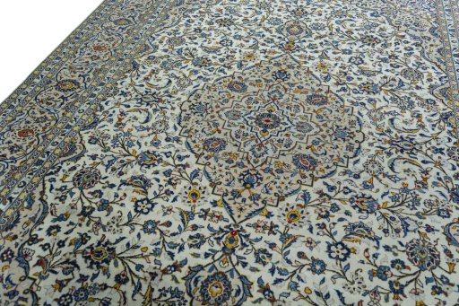 Backside of handmade 2000s Kashan rug showing knot structure and weave density