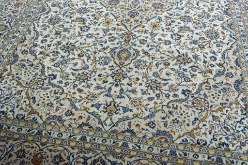 Close-up detail of 2000s Kashan rug from Iran / Persia showing Wool weave