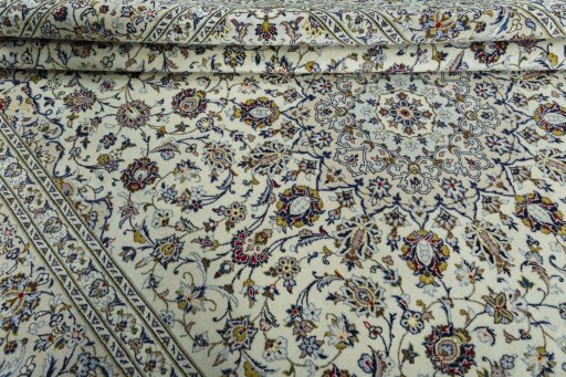 Close-up detail of 2000s Kashan rug from Iran / Persia showing Wool weave
