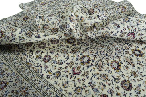 Surface texture of 2000s Kashan rug with natural Wool and intricate pattern