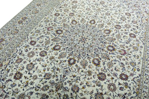 Backside of handmade 2000s Kashan rug showing knot structure and weave density
