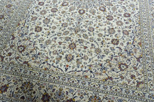 Close-up detail of 2000s Kashan rug from Iran / Persia showing Wool weave